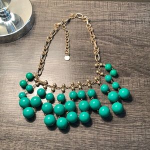 Stella & Dot Gold and Kelly Green necklace.